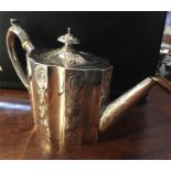 Georgian silver teapot of ovoid form with embossed decoration