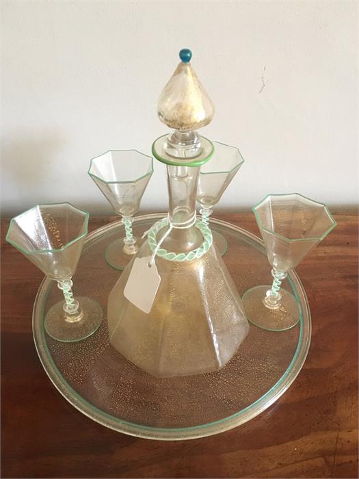 Murano glass decanter and four glasses on tray with gold mica flecks and air twist stems