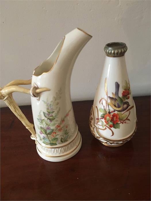 Royal Worcester ewer and a bird decorated vase tallest 19cms