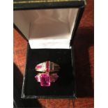 A 10ct gold gem set ring with a 9ct gold ruby and diamond ladies ring