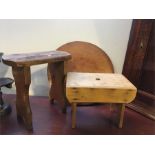 Two stools and round wooden paddle