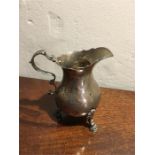 Small late 18th c creamer on three feet 3.58 ozt