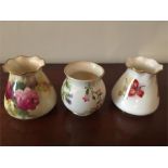 Three small Royal Worcester small vases one by M Miller 8.5 cm high