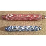 Two good quality 19th c Nailsea glass rolling pins pink/white and blue/white 43 cms long max.