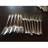 Twelve matched 7 & 5 silver cake forks 6.35 ozt