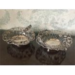 Two 18th c swing handle London silver sweetmeat baskets with grape decoration