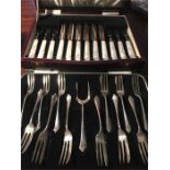 Two boxed sets one silver cake forks and one fruit knives and forks