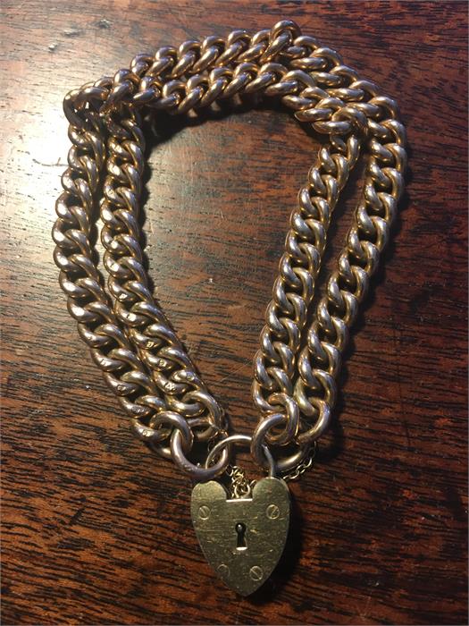Ladies double 9ct gold bracelet with heart shape lock 22.6gms