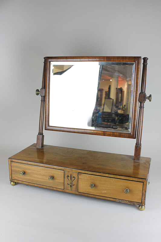 A Regency mahogany dressing table mirror with box base and two drawers, on ball feet, 52.5cm, (a/f)