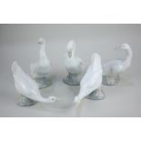 A set of five Nao porcelain ducks in various poses, tallest 15cm high