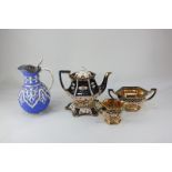 A Victorian gilt lustre tea service to include a teapot, stand, cream jug and sugar bowl, and a