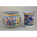 Two Poole Pottery vases, one of rounded form, the other of tapered form with flared rim, both