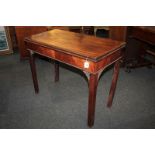 A George III mahogany rectangular card table with fold-over top with extending concertina action (