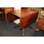 A 19th century mahogany Pembroke table with shaped rectangular top, on turned baluster stem and