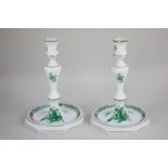 A pair of Herend Hungarian porcelain candlesticks in Chinese Bouquet green pattern, the baluster