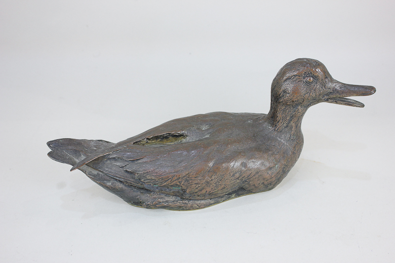 A Christofle brass model of a duck, marks to base