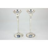 A pair of American Wallace sterling silver candlesticks with removable candle holders creating bud