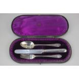 A Victorian cased silver christening set of knife, fork and spoon, engraved and dated 1915