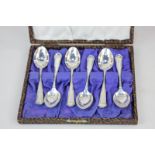A cased set of six Continental white metal teaspoons marked 800