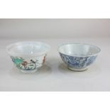 A Chinese porcelain circular bowl decorated with birds and blossom, 11.5cm, and another blue and