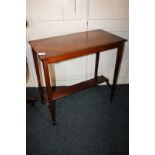 An Edwardian inlaid mahogany rectangular side table with trailing foliage and floral decorated