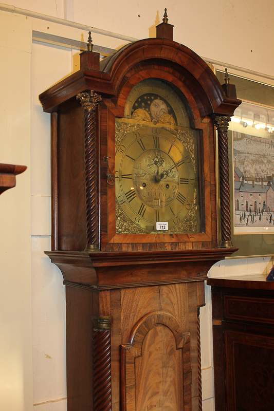 A George III mahogany longcase clock with 12 inch arch brass dial marked Richard Wills, Truro,