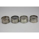 A set of four Edward VII silver napkin rings, maker GM, Sheffield 1907, 2oz