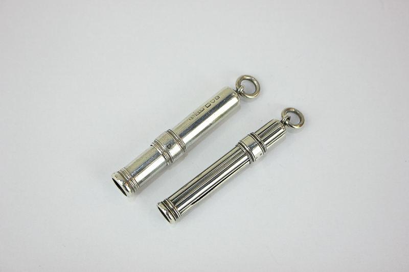 Two S Mordan silver propelling pencil holders with ring terminals, one plain, hallmarked London