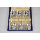 A matched set of six Edward VII silver teaspoons, maker Walker & Hall, Sheffield 1903, 1906, 1908,