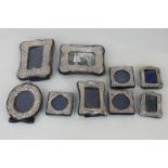 Nine small silver mounted photograph frames, various dates and makers, (a/f)