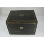 A Victorian brass bound coromandel wood vanity box containing fourteen Victorian silver mounted