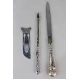 An Elizabeth II silver mounted letter opener, maker J Francis Howard Ltd, Sheffield 1988, a white