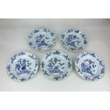 Five Chinese porcelain blue and white plates, each decorated with a bridge amongst bamboo and