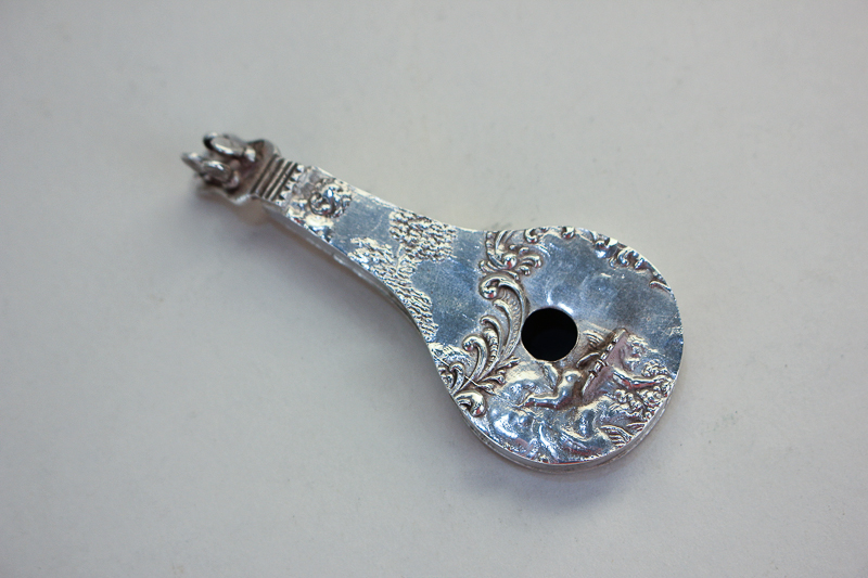 A Victorian Dutch silver model of a mandolin, import marks for David Bridge, London 1896, also
