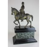 A bronze model of Bartolomeo Colleoni, after Andrea del Verrochio, 35cm high, standing on a veined