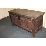 An oak coffer with carved linen panel front and sides, 102.5cm, (a/f)