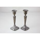 A matched pair of George V silver candlesticks, makers Clark & Sewell, Chester 1914, and possibly