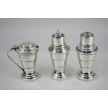 A George V silver Art Deco cruet set, maker A L Davenport Ltd, Birmingham 1933, comprising sale,