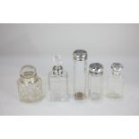 A George V silver mounted cut glass scent bottle, maker Corke Brothers & Co, London 1913, a set of