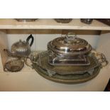 A silver plated spiral reeded teapot, a rectangular and oval tureen with cover, two twin-handled