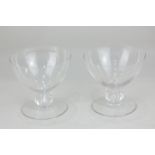 A pair of Lalique clear glass comport dishes, the pedestal with ridged design, etched mark to base