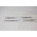 Two late Victorian silver plated meat skewers