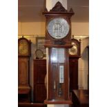 A Victorian oak cased Admiral Robert Fitzroy Torricelli barometer with storm glass and