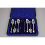 A cased set of six George V silver teaspoons with sugar tongs, maker Levesley Brothers, Sheffield