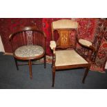 A Victorian inlaid dining chair with padded back rail, arms and seat, and an oval chair with bow