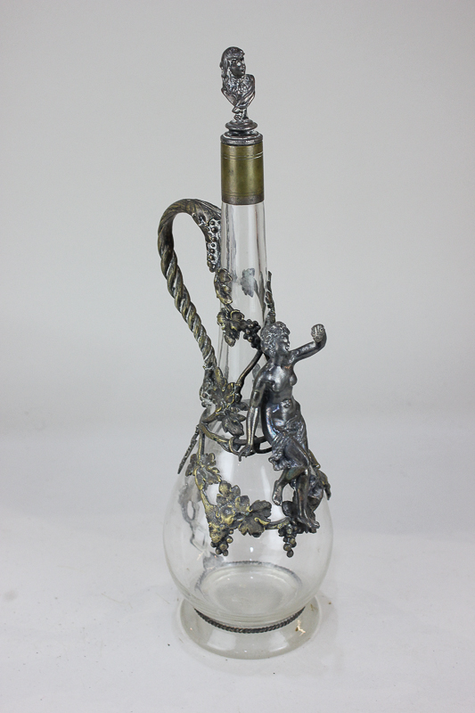 A WMF metal mounted glass decanter and stopper, teardrop form, decorated with a classical figure