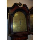 A George III oak longcase clock with 13 inch arched brass dial, marked Harris, Wellington, in swan