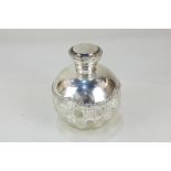 A George V silver mounted cut glass scent bottle with stopper, maker's mark worn, Birmingham 1912,