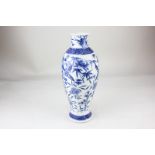 A Chinese blue and white vase, baluster shape, decorated with birds amongst blossom, six figure seal