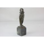 Herrmann, a small bronze figure of a child in clown costume standing on marble plinth, 14cm